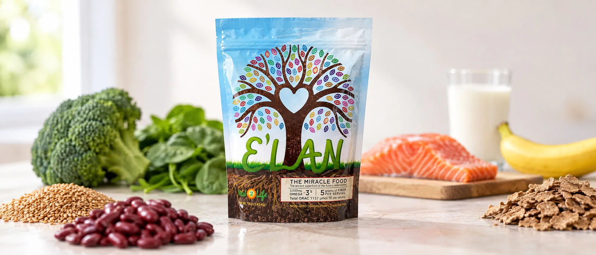Seen from counter height with a shallow focus, the E'LAN pouch standing sharp on a pale stone worktop with the foods it is measured against softening away either side: a mound of golden flax seed and a heap of red kidney beans in front, a head of broccoli and a bunch of spinach behind on the left, a raw salmon fillet on a wooden board, a tall glass of milk and a banana behind on the right, and a scatter of bran flakes at the edge.
